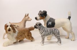A collection of Wade Ceramic Northlight Figures of Dogs, tallest 22cm. These were removed from the
