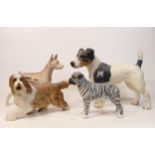 A collection of Wade Ceramic Northlight Figures of Dogs, tallest 22cm. These were removed from the