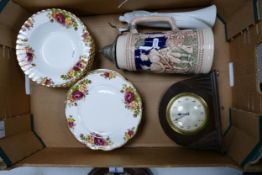 A mixed collection of items to include floral Sheriden pottery plates & rimmed bowls, German Beer