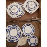 A collection of Royal Cauldon Dragon Patterned Dinner Ware including, tureens, platter, dinner