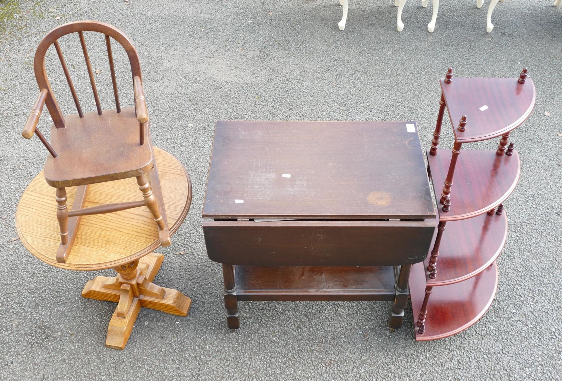 A dark oak drop leaf serving trolley together with Oak children's chair, solid oak circular table