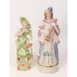 Two Continental lady figures . Height of tallest 28cm