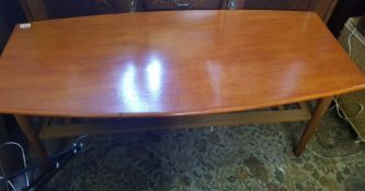 Mid century modern teak coffee table with magzine shelf rack below