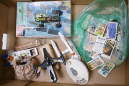 A mixed collection of items to include vintage Star trek Toys, Dinky Star fighter toy vehicle,