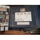 A collection of first day covers and stamps in 5 binders/albums.