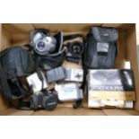 A collection of vintage digital cameras to include Olypmus SP550 UZ, Nikon cool pix P500, Samsung