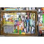 A collection of vintage play worn toys to include Corgi, Dinky , Matchbox etc
