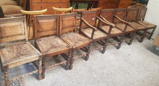 Heavy Set of 8 Carved Oak Dining Chairs with twist leg supports & rush seats including 2 arm