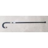 Silver tipped walking stick. Length 86cm