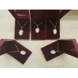 Five cased Wedgwood jasperware pendants on gold plated chains (5).