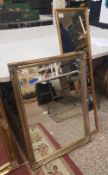 A bevelled edged ornately framed wall mirror, together with a vintage hall mirror, bevelled edged