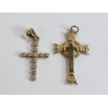 Two 9ct gold crosses, 2.3g. (2)