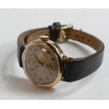 9ct gold Omega small wristwatch, octagonal dial with leather strap.