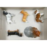 A collection of Beswick dogs to include Cocker Spaniel 1754, Begging Dachshund 1461, Corgi 1736,
