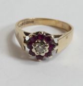 9ct gold ladies ring set with white central surrounded by red stones, size M, 3.3g.