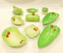 A collection of Beswick Tomato Patterned green dishes , gravy boat & butter dish (10)