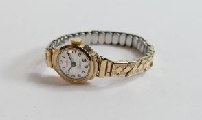 Ladies 9ct gold Limit wristwatch with gold plated expandable bracelet.