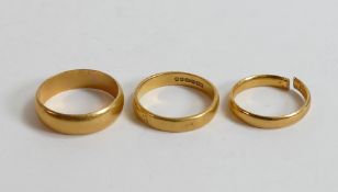 Three 22ct gold wedding rings,one cut,12.8g.