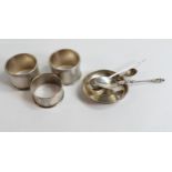 A collection of solid Silver ware including serviette rings, spoons, tongues etc, 164.6g.