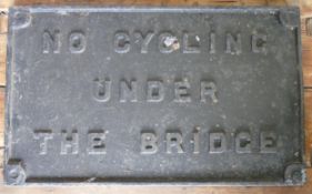 Original cast iron No Cycling Under The Bridge railway sign, 29 x 48cm.