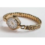 Ladies 9ct gold wristwatch with gold plated expandable bracelet.