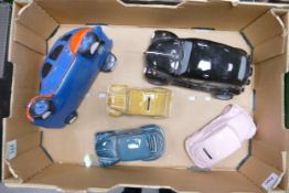 A mixed collection of items to includ Novelty VW Beetle & Citreon 2CV theme Money Boxes etc These