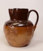 Doulton Lambeth Embossed Salt glazed water jug, height 16cm