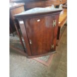 George III Bowfronted Corner cupboard with functioning lock and key. height 67cm (likely later
