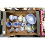 A collection of multicolored Wedgwood Jasperware including wall plates, vases, milk jug, lidded