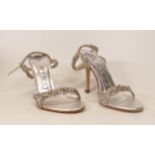 Designer Gina Silver Jupiter Sandals . Made of silver leather upper adorned with silver Swarovski