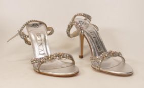 Designer Gina Silver Jupiter Sandals . Made of silver leather upper adorned with silver Swarovski