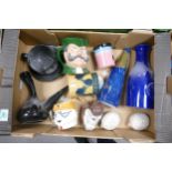 A mixed collection of Wade items to include vases, decanters, condiment pots, Holly Hedghog figure