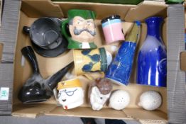 A mixed collection of Wade items to include vases, decanters, condiment pots, Holly Hedghog figure