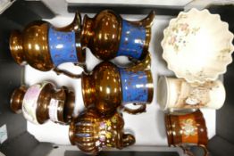 A mixed collection of items to include Gibson type water jugs Floral footed bow etc