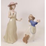 Two Nao figures girl with puppy and a lady holding a flower. Height of tallest 26cm (2)