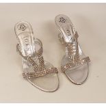 Designer Gina Silver slide Sandals . Made of silver leather upper adorned with silver Swarovski