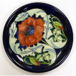 Moorcroft Poppy charger. Diameter 26cm. Seconds in quality