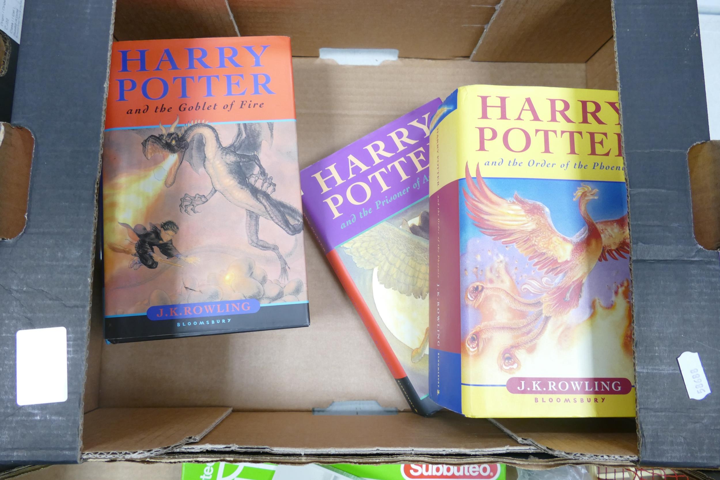 A collection of 1st Edition Harry Potter Hard Back Books