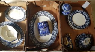 A mixed collection of early 20th century blue and white dinner ware to include Oval platters, dinner