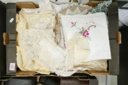 A mixed collection of vintage linen & lace including table cloths, doilies , embroidered items etc
