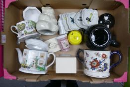 A collection of Wade Twin Handled Tankard, Novelty Teapots, Pin Dishes etc These were removed from