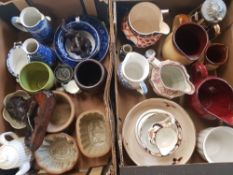 A mixed collection of items to include jugs, stoneware jelly/mousse moulds, carved hardwood lion etc