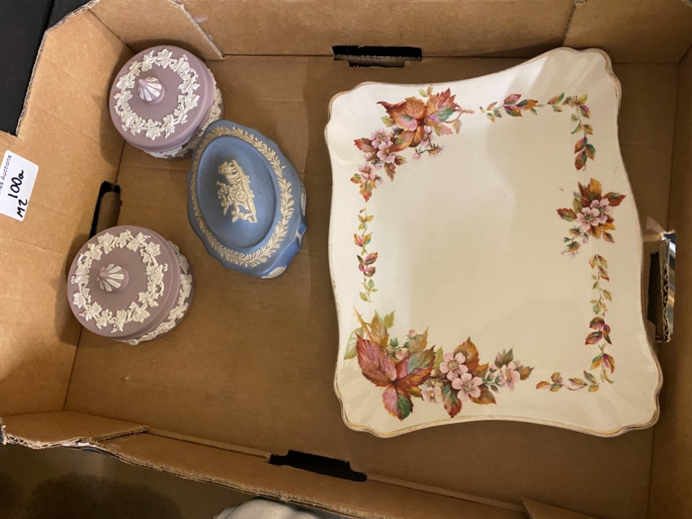 Two Wedgwood lilac jasper ware lidded pots, together with a blue jasper ware trinket pot and a Royal