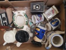 A mixed collection of ceramic items to include Masons Photo frame, 1982 World cup Mug, novelty tea