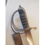 Vintage Indian Talwar sword with fullered blade, original scabbard, 83.5cm in total length.