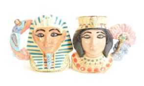 Royal Doulton pair of small character jugs Tutankhamen D7127 and Ankhesenamun D7128(2)