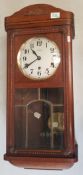 1930s Oak cased Vedette 8 day Clock with pendulum and key