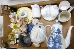 A mixed collection of items to include Blue & White pottery, Continental figures, Pie Funnels etc