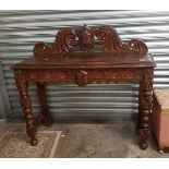 Late Victorian oak hall/console table, with profusely carved Gothic detail, 114cm in width, 43cm