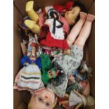 A mixed collection of vintage dolls and accessories